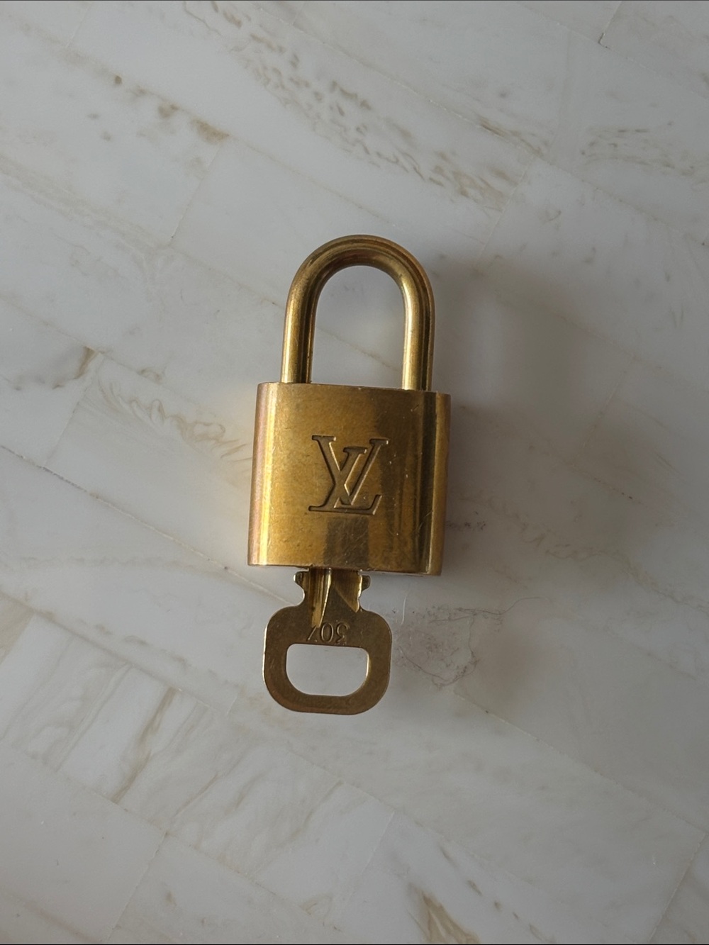 Louis Vuitton Gold-Tone Lock with Key